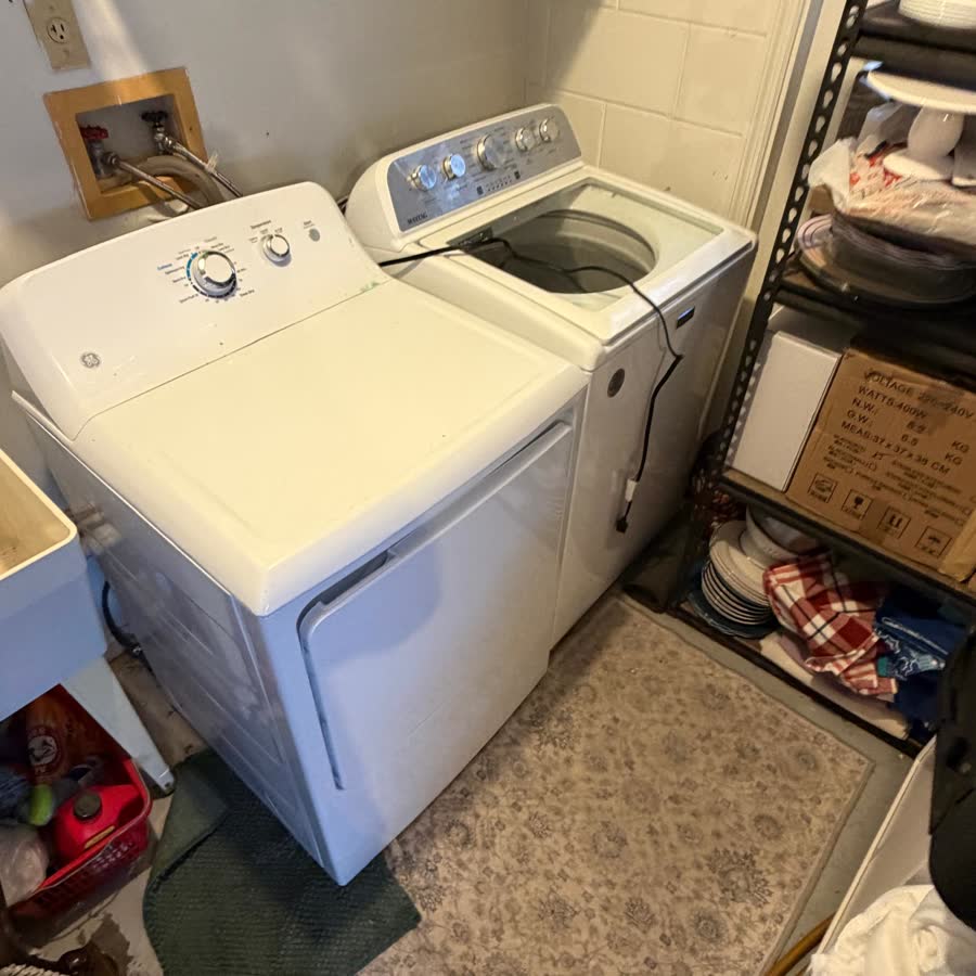 Maytag top-load washer in the customer laundry room